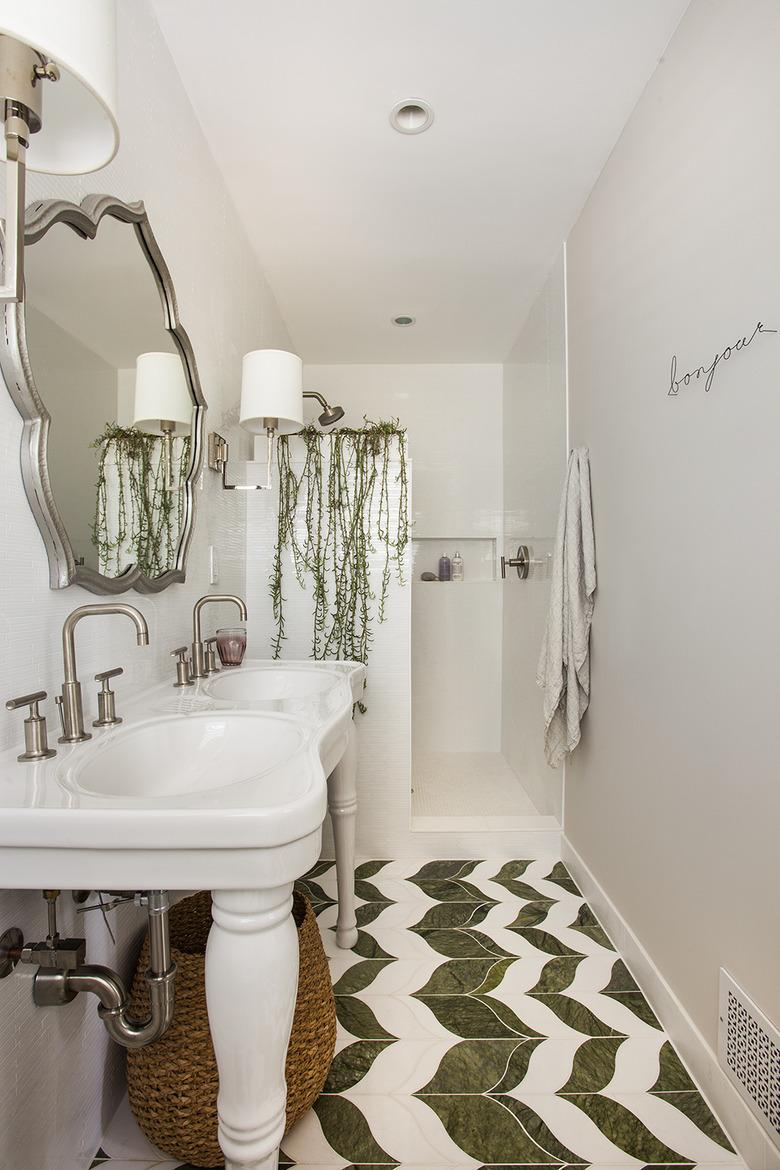 Photo of bathroom with half-wall walk-in shower.