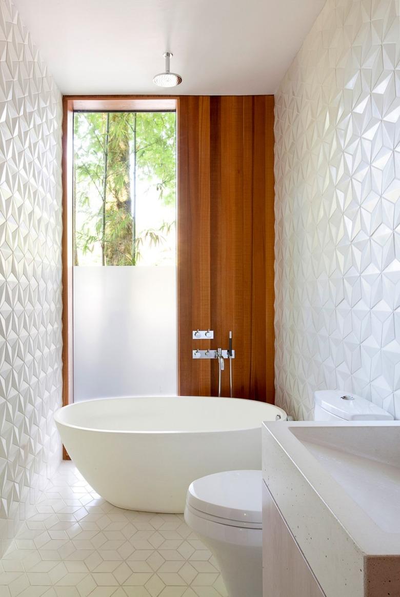 bathroom with geometric pattern wall tile