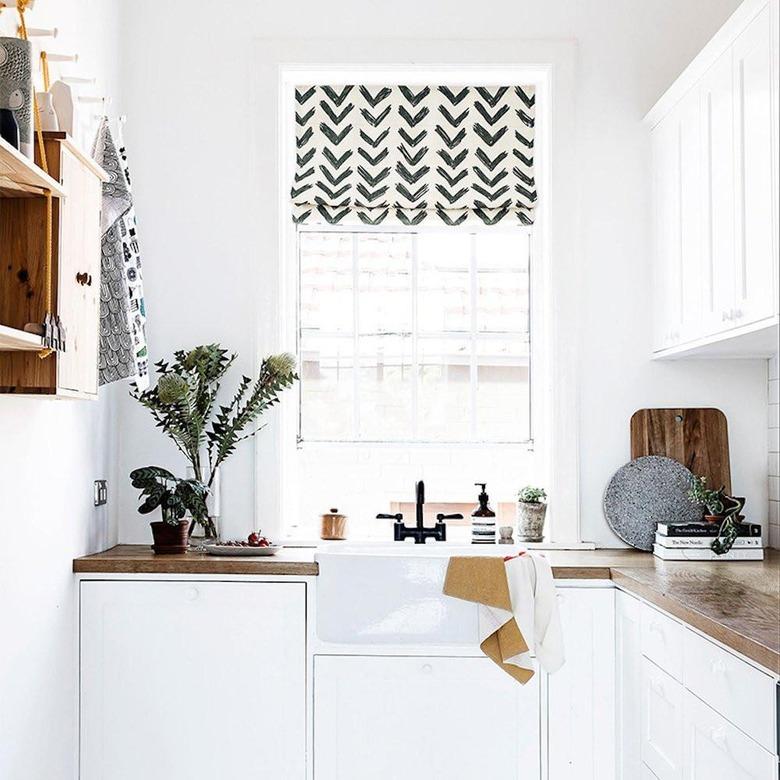 roman shade above kitchen sink