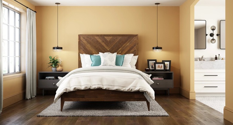 bedroom with yellow-toned walls