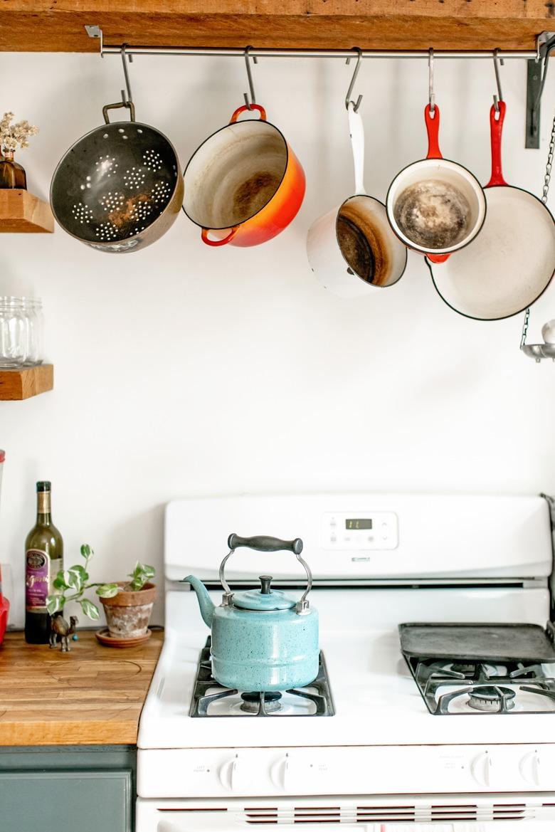 hanging pots above stove