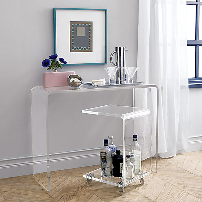 CB2 acrylic furniture console table and rolling cart