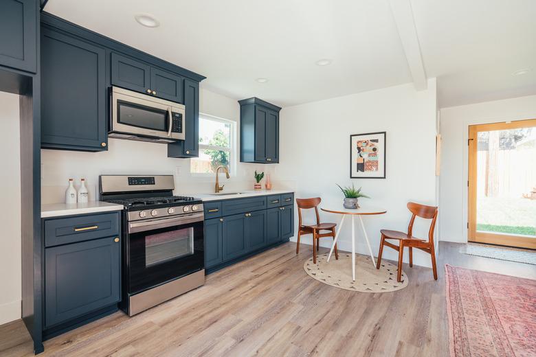 blue cabinets in small kitchen