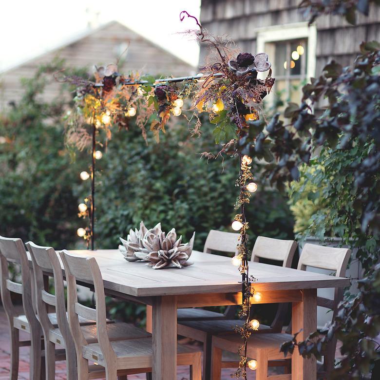 outdoor dining with string lights