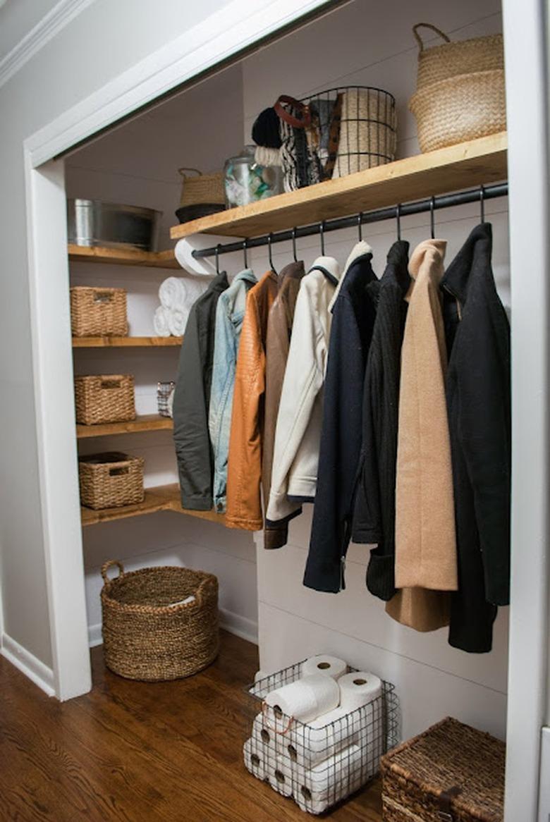 Bedroom with no closet doors.