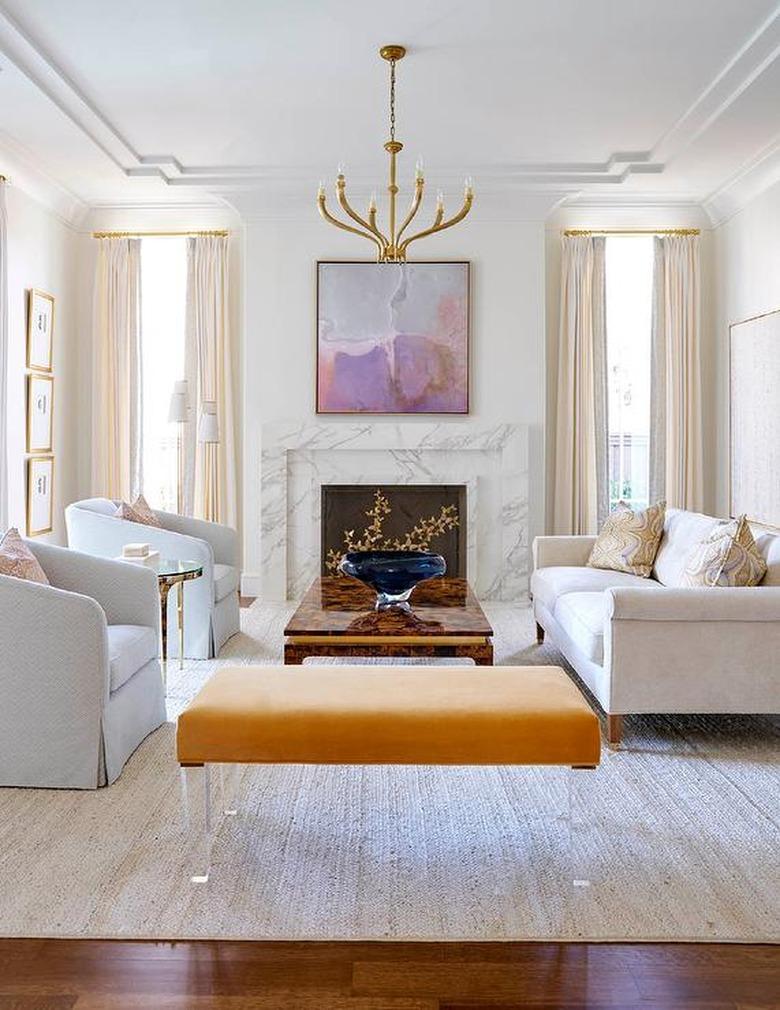 art deco decorating on a budget in living room with molding and fireplace