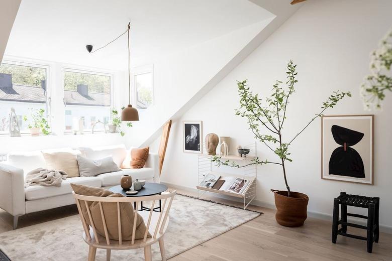 attic living room with Scandinavian-inspired attic with muted colors