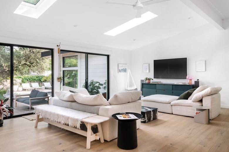 open white living room with wood floors