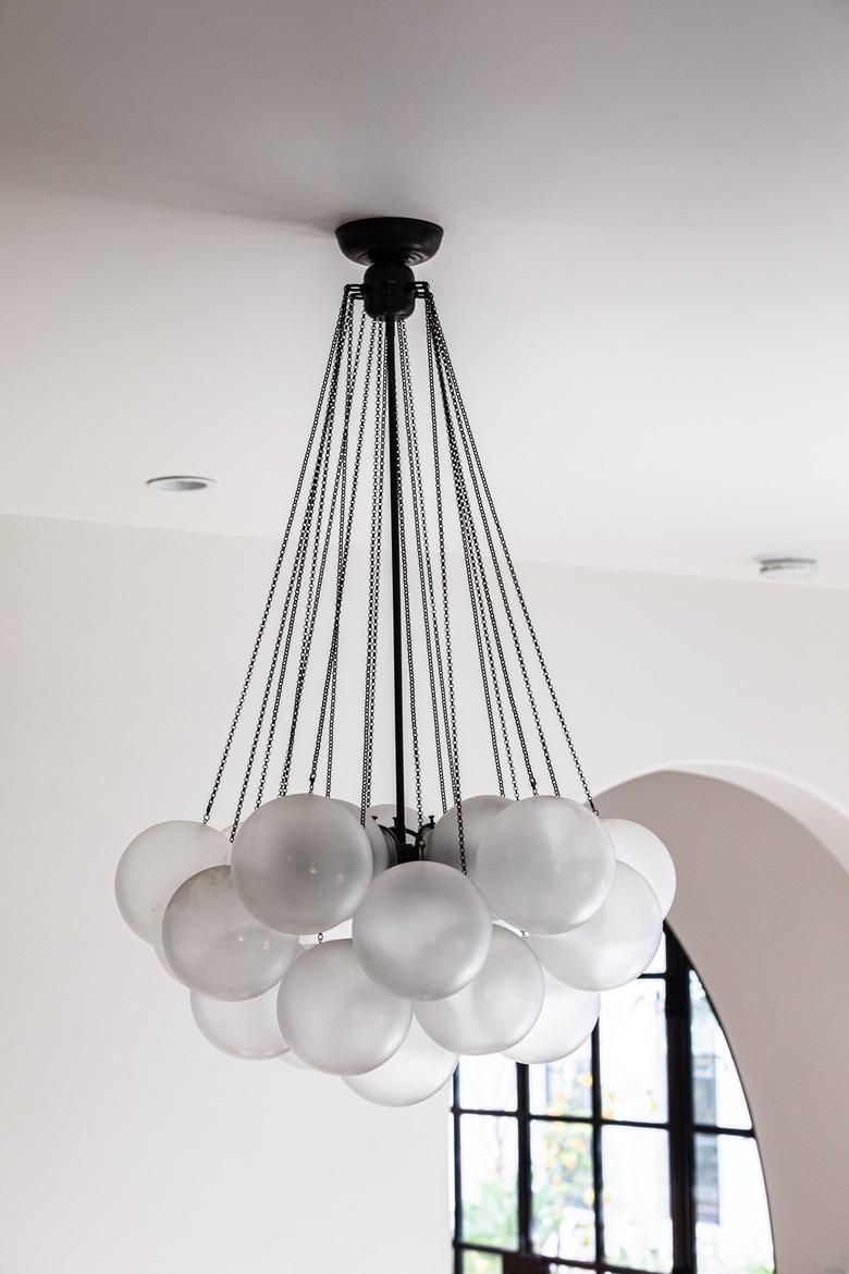 A multi globe pendant chandelier