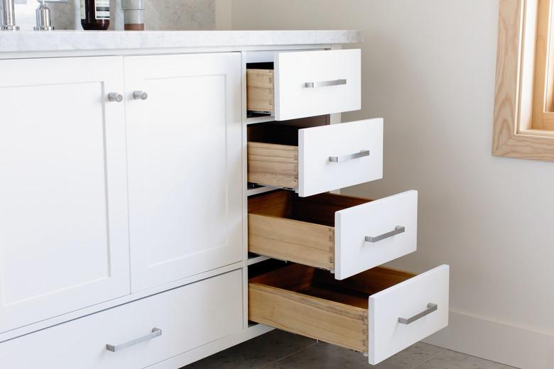 bathroom vanity with open drawers