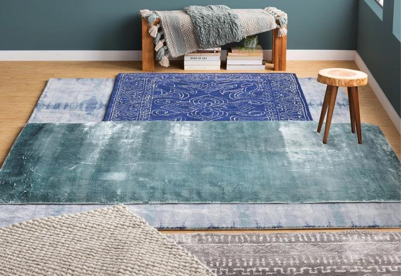 layered blue rugs