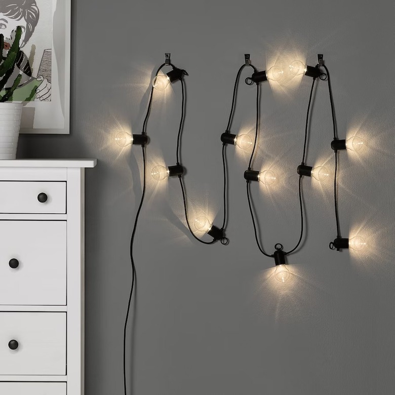 String lights from IKEA hung on a wall