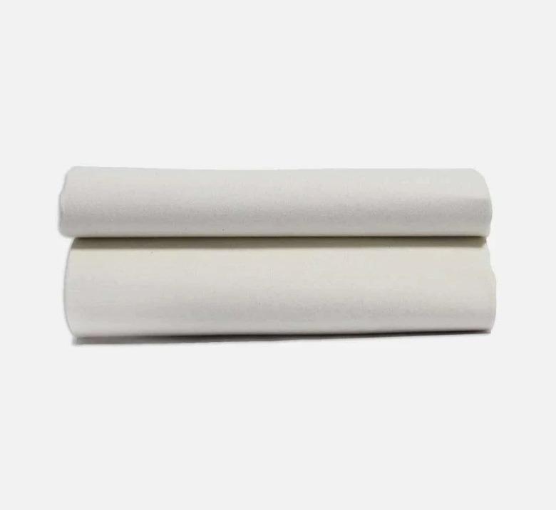 two folded mattress protectors