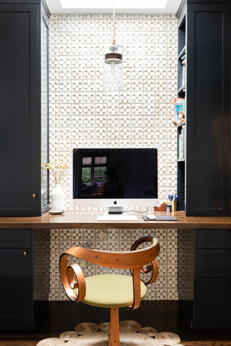 modern office nook with floating shelf desk and apple computer