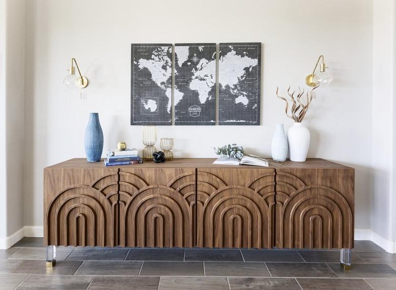 Glass dome sconces in hallway designed by Living with Lolo