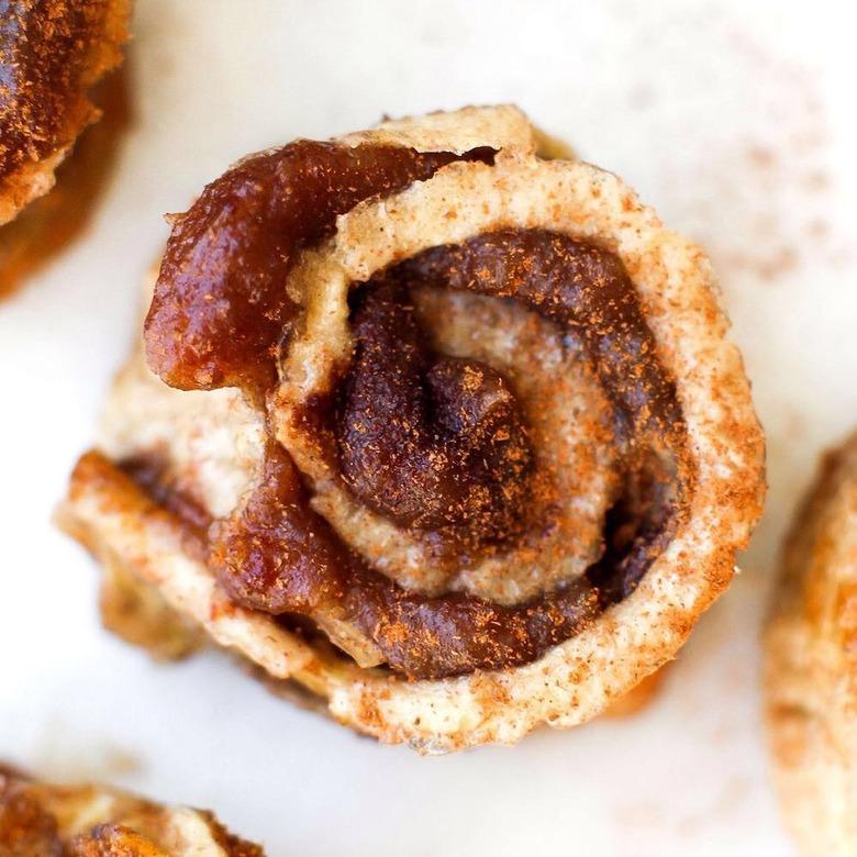 Overview of a banana cinnamon roll on a white countertop.