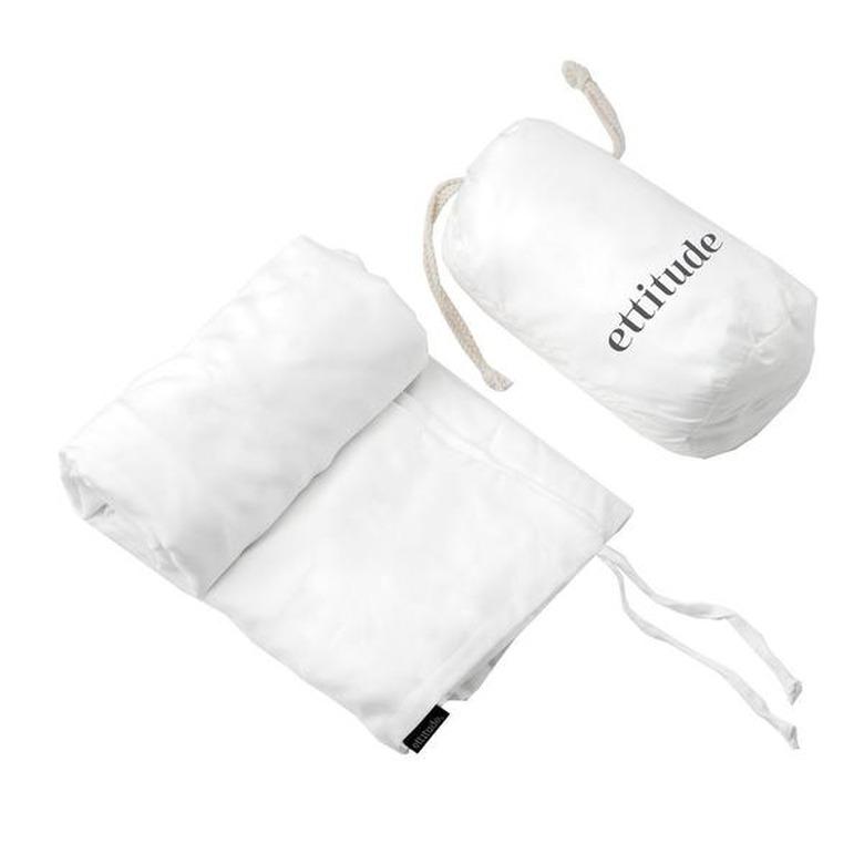 White travel sheet and bag