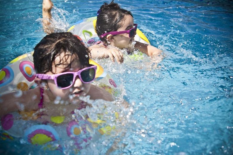 A backyard pool is a great place for friends.