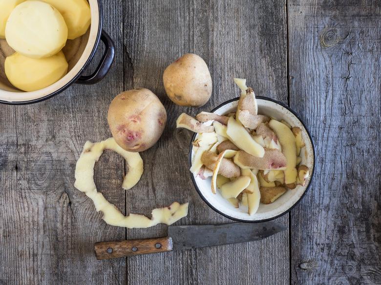 Directly Above Shot Of Peeled Potatoes On Table