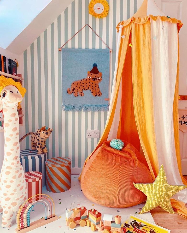 circus-themed children's room with soft color palette