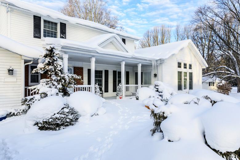 Early Morning Sunshine Colonial Style Home After Extreme Blizzard Snow Storm