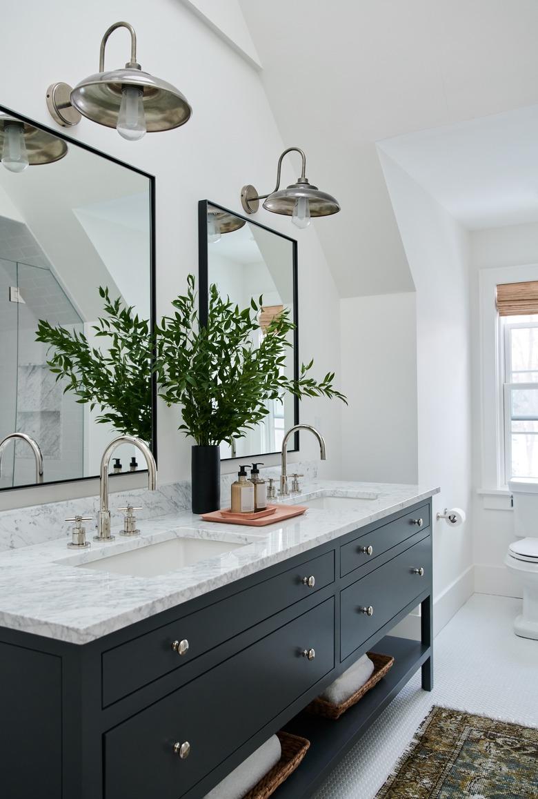 double vanity with undermount bathroom sinks and marble countertop and black vanity