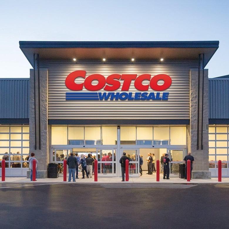 Costco storefront with logo and people outside