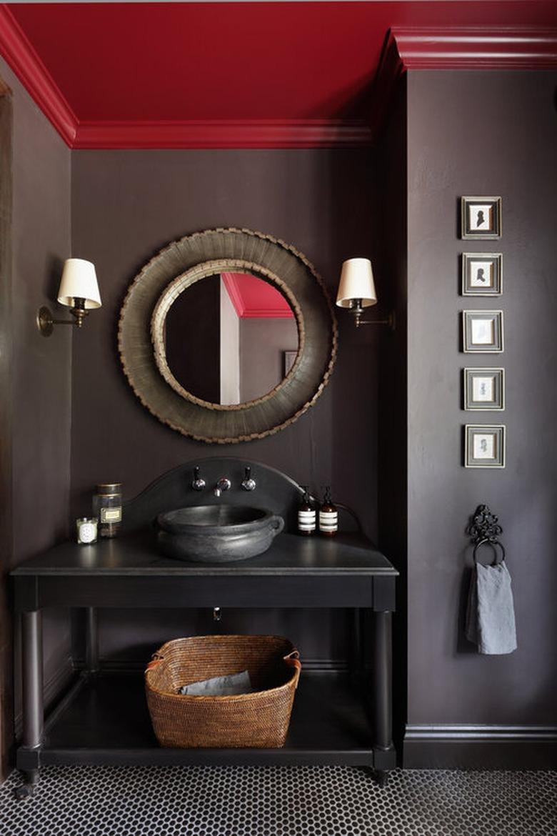 red painted ceiling with brown painted walls and penny tile floor