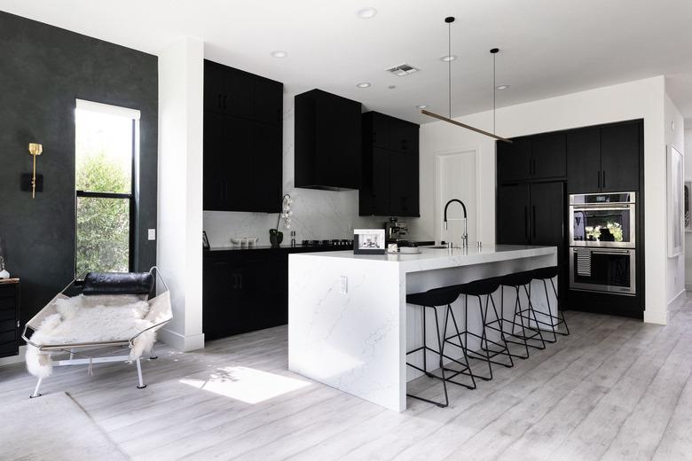 dark kitchen cabinets with light floors in gray color