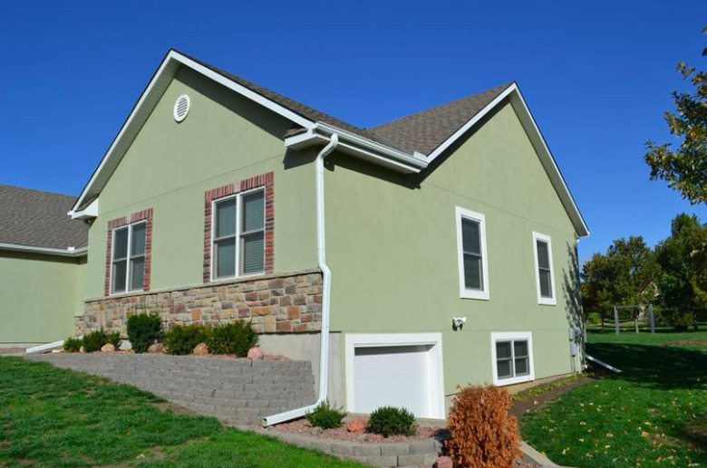 House with stucco siding.