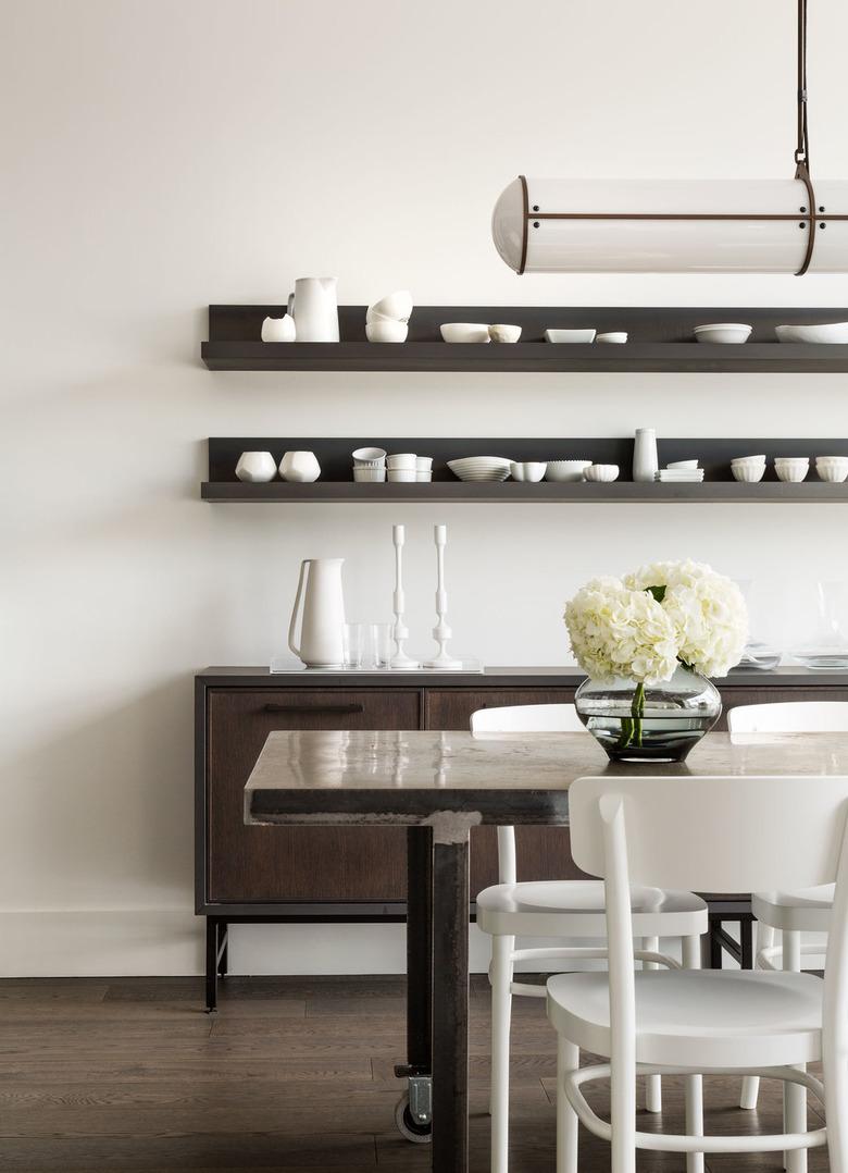 Dining Room Shelves above storage cabinet by Croma Design