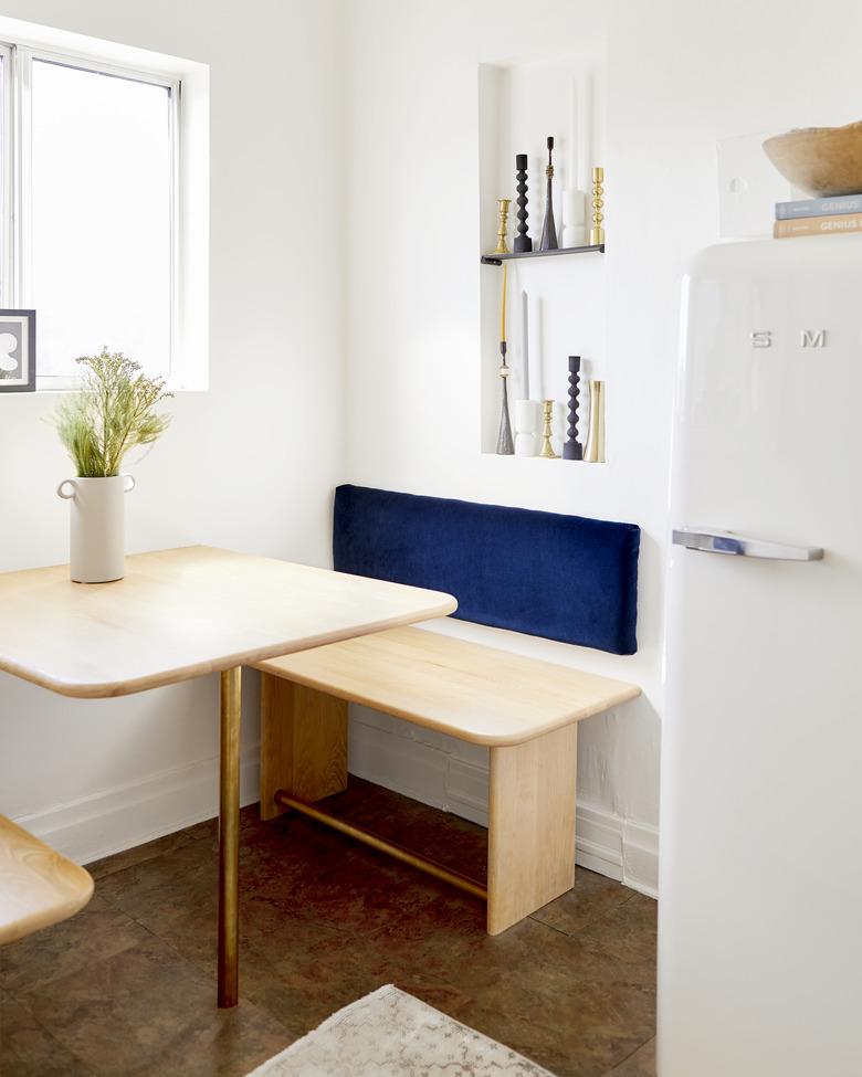 Inset dining room shelves in Small Dining Nook with bench