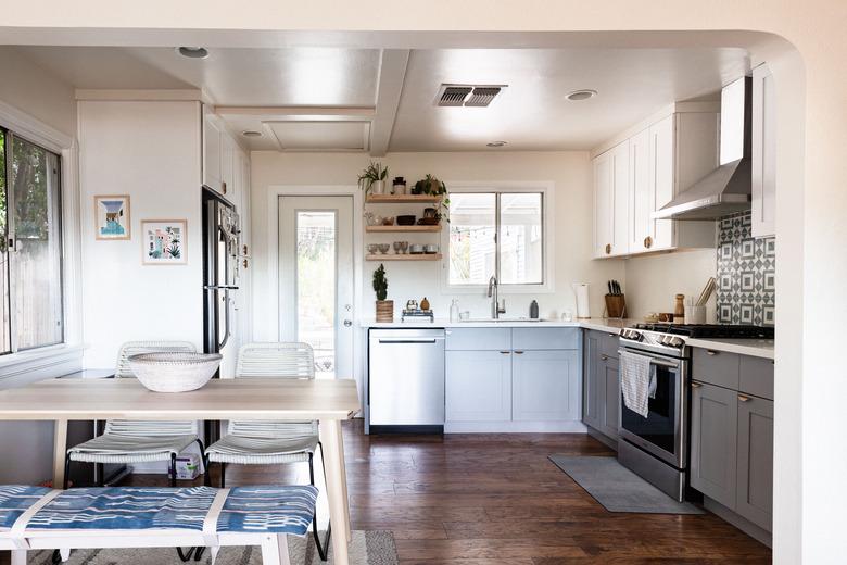 simple kitchen with small dining area and l-shaped layout