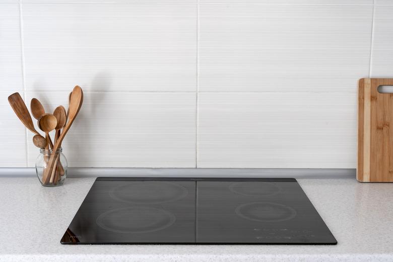 Kitchen with built in ceramic induction stove