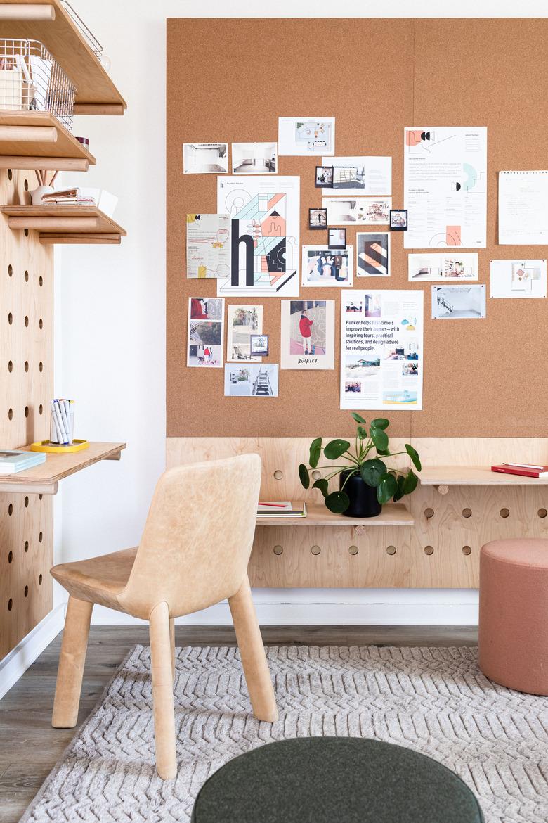 Pegboard and cork wall at Hunker House