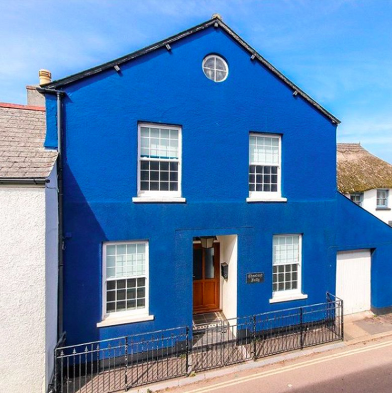 Blue exterior house colors with wood door