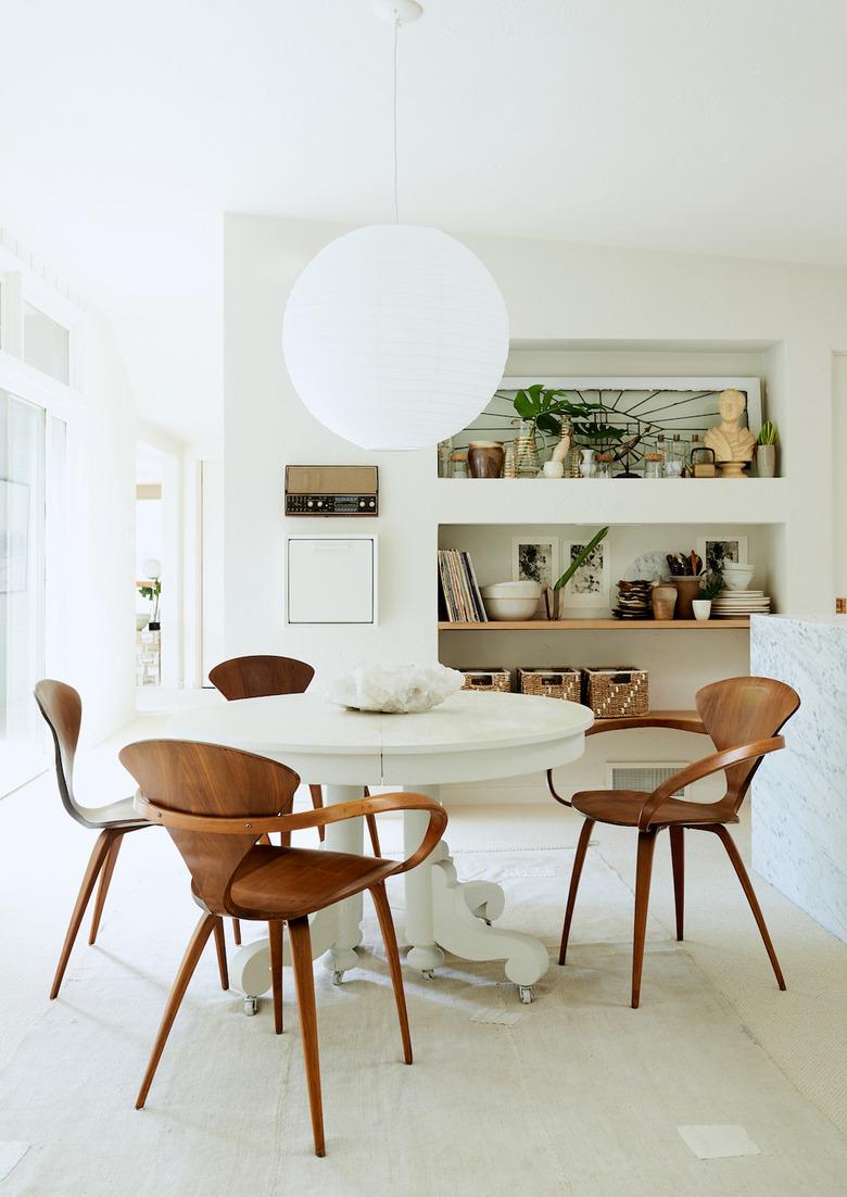 dining room with paper pendant light fixture