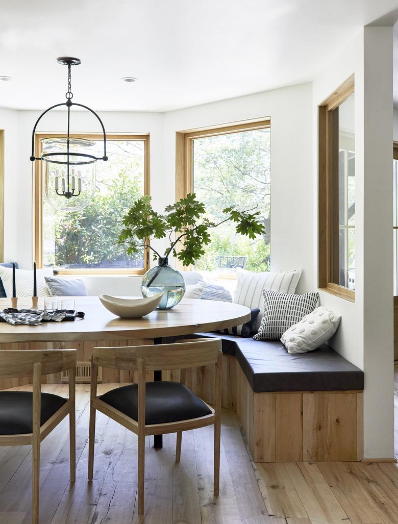 dining room with fresh foliage centerpiece