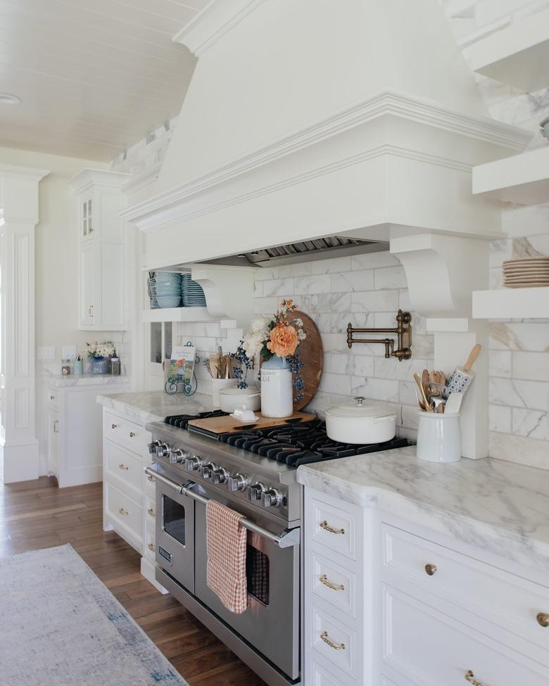 fall kitchen decor in white kitchen with flowers in vase