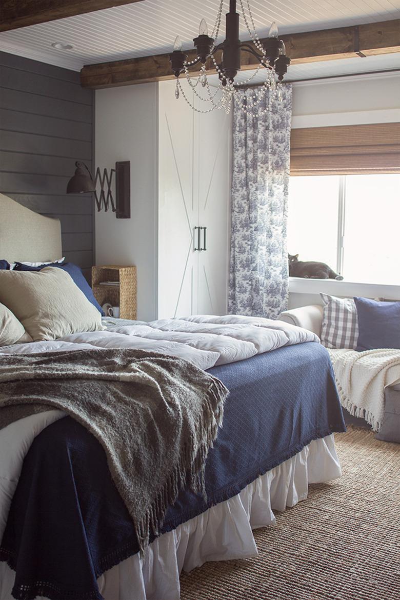 blue-and-white toile curtains in bedroom