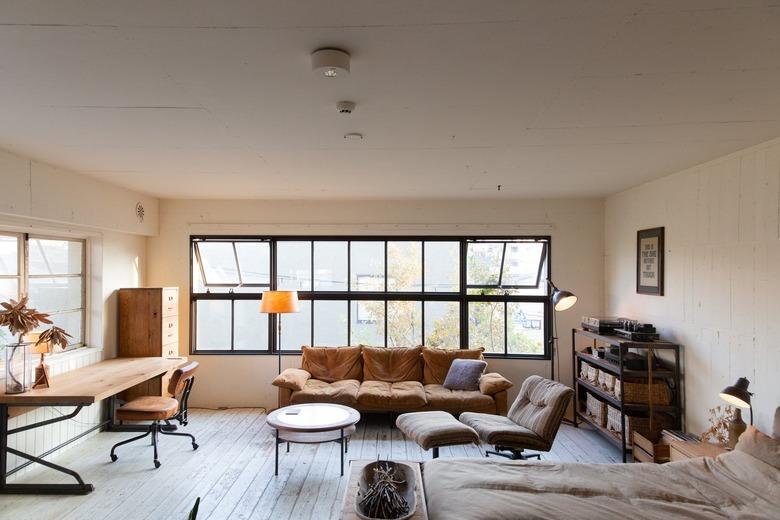 one section of the showroom illustrates an office setup; another simulates a living room