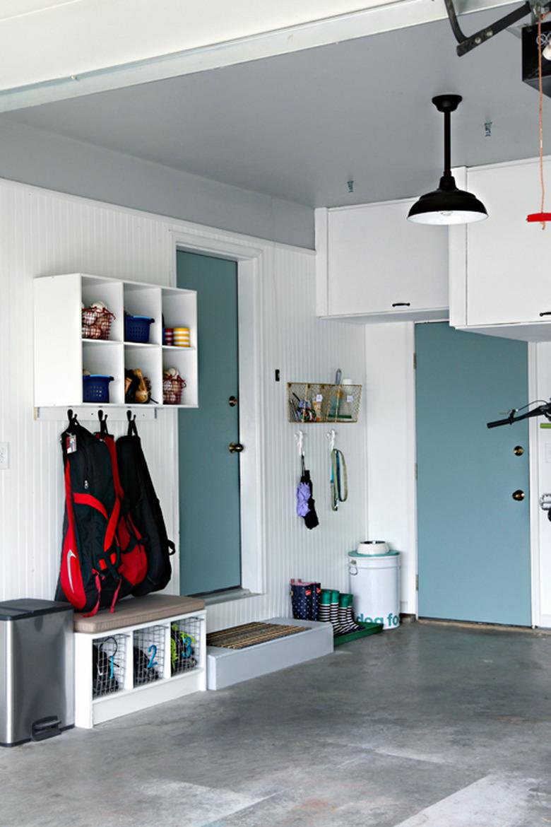 garage mudroom with overhead storage and concrete floors