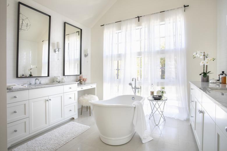 White home showcase interior bathroom with soaking tub