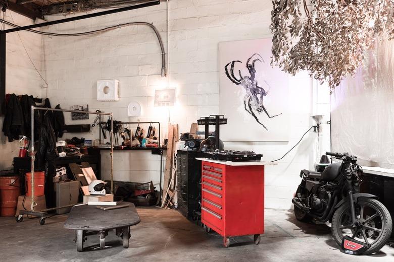 Loft with large red tool storage cabinets