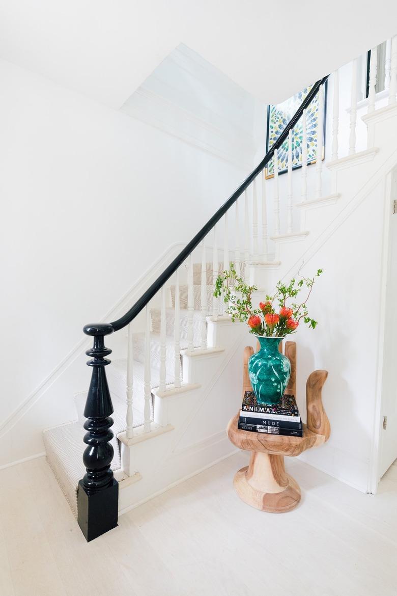 wooden hand chair in entryway