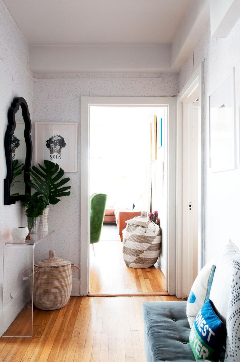 hallway idea with console table and accent bench for seating