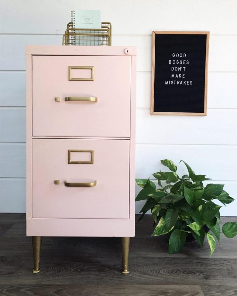 pink chalk paint file cabinet with white shiplap wall and letterboard