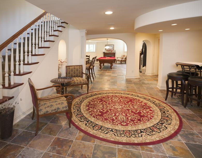 Exceptional finished basement with tiled floor, pool table