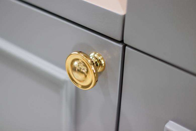 Close-up of the room's white wood cabinets