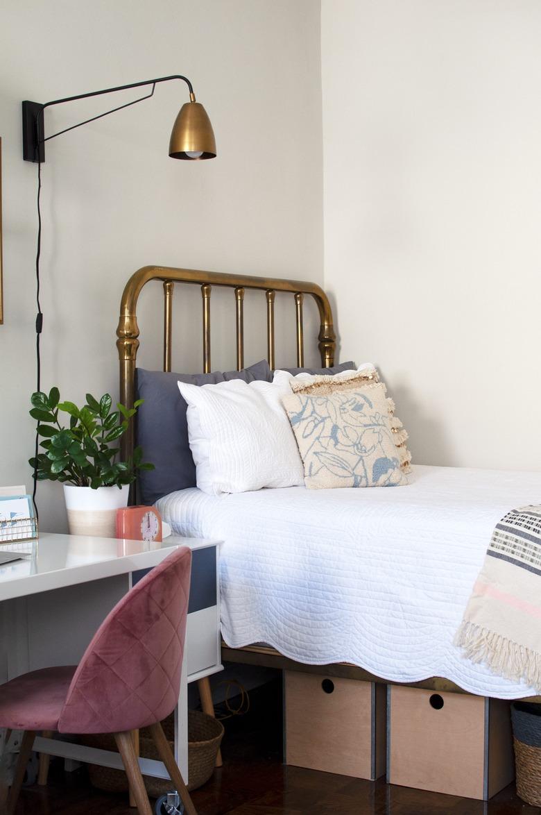 bedroom with under the bed storage and desk as side table